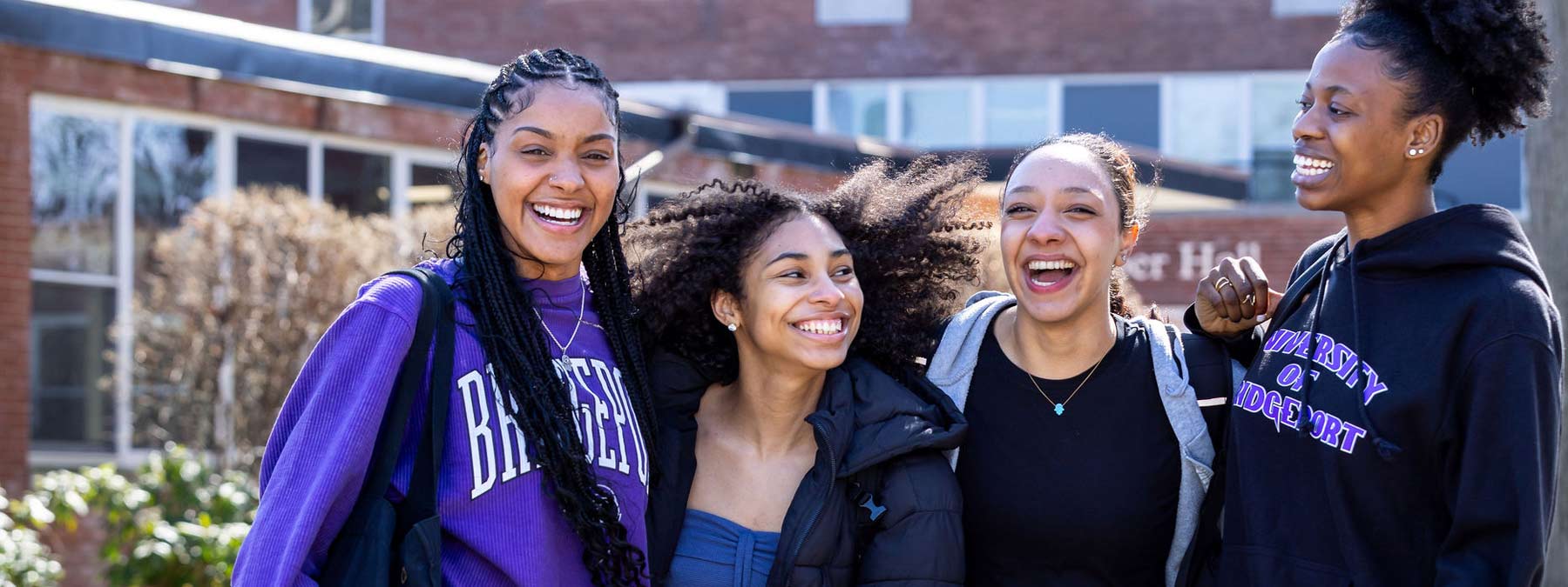 group of smiling and laughing